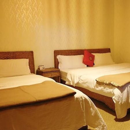 Aparthotel Li Dao Yuan Li-ťiang Pokoj fotografie